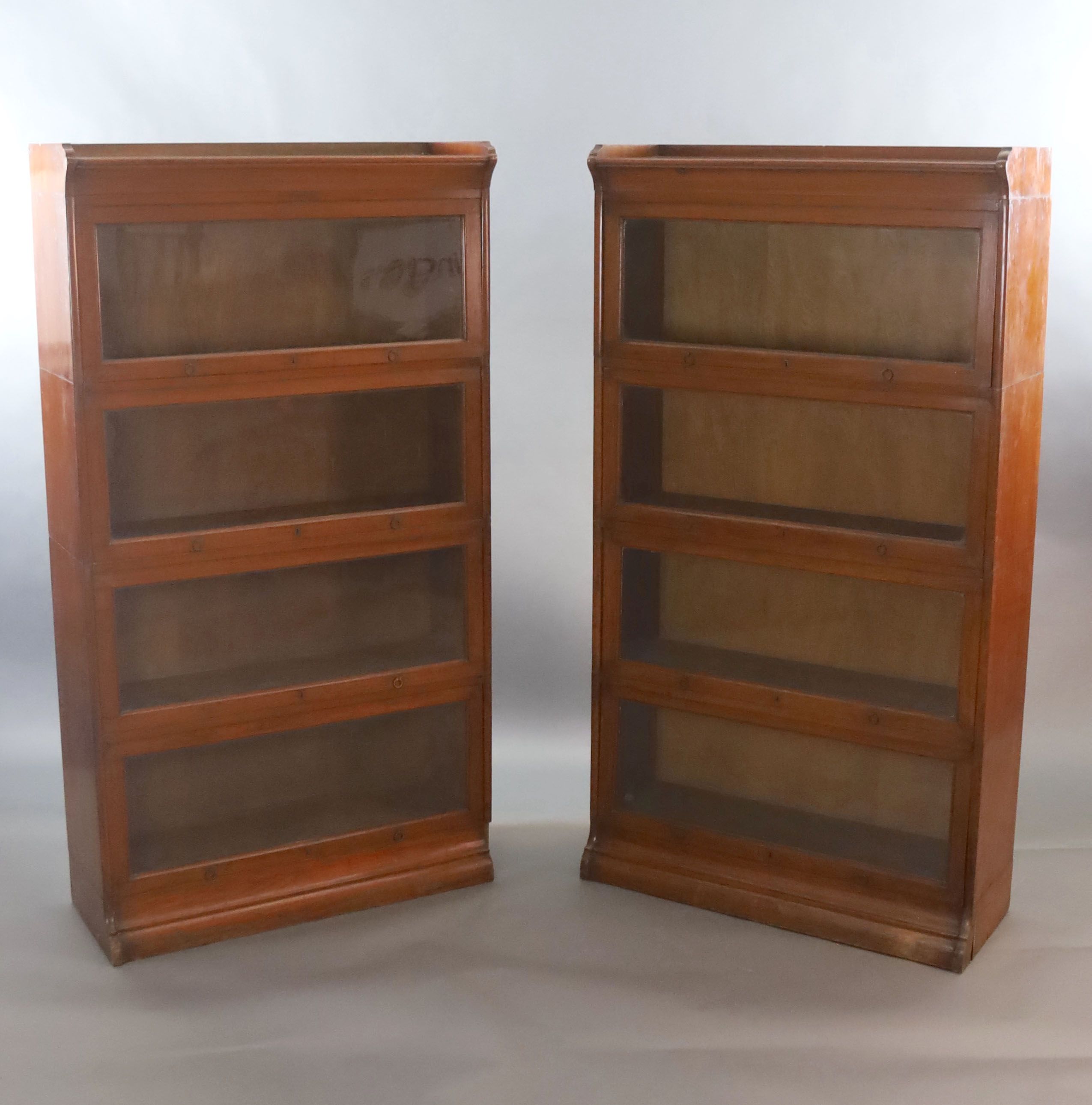 A pair of Globe Wernicke style oak sectional bookcases, W.91.5cm D.32cm H.168cm